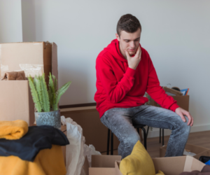 college student packing boxes